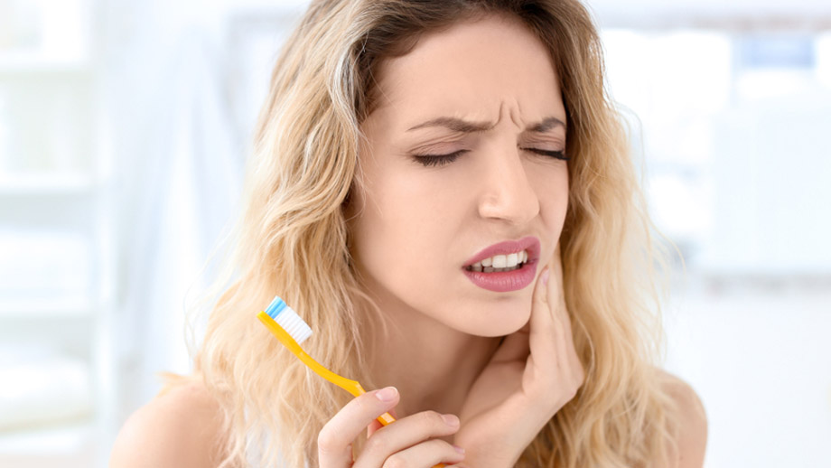 Why Does My Tooth Hurt When I Brush? Find Relief Now!